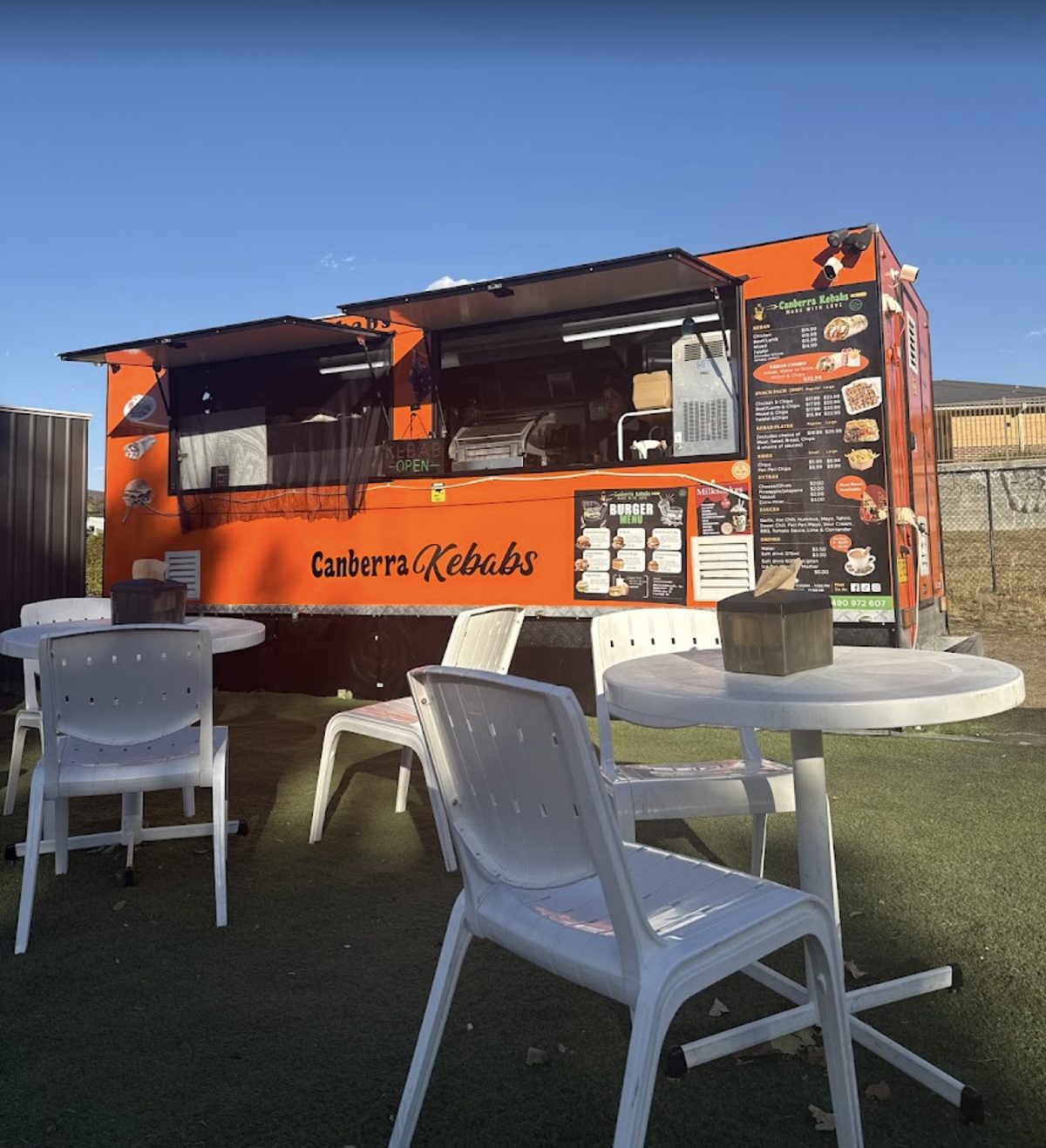 Outdoor seating in front of the Canberra Kebabs truck